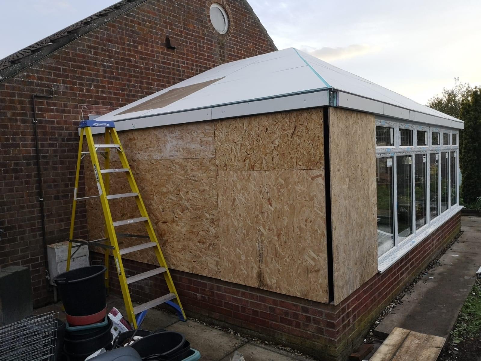 Chipboards for wooden panels on tiled roof conservatory