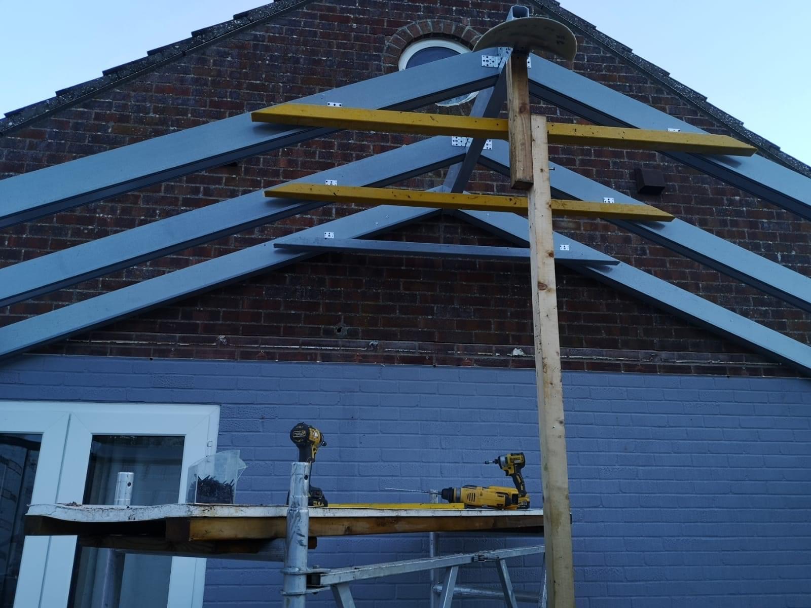 Steel beams for conservatory roof with tools