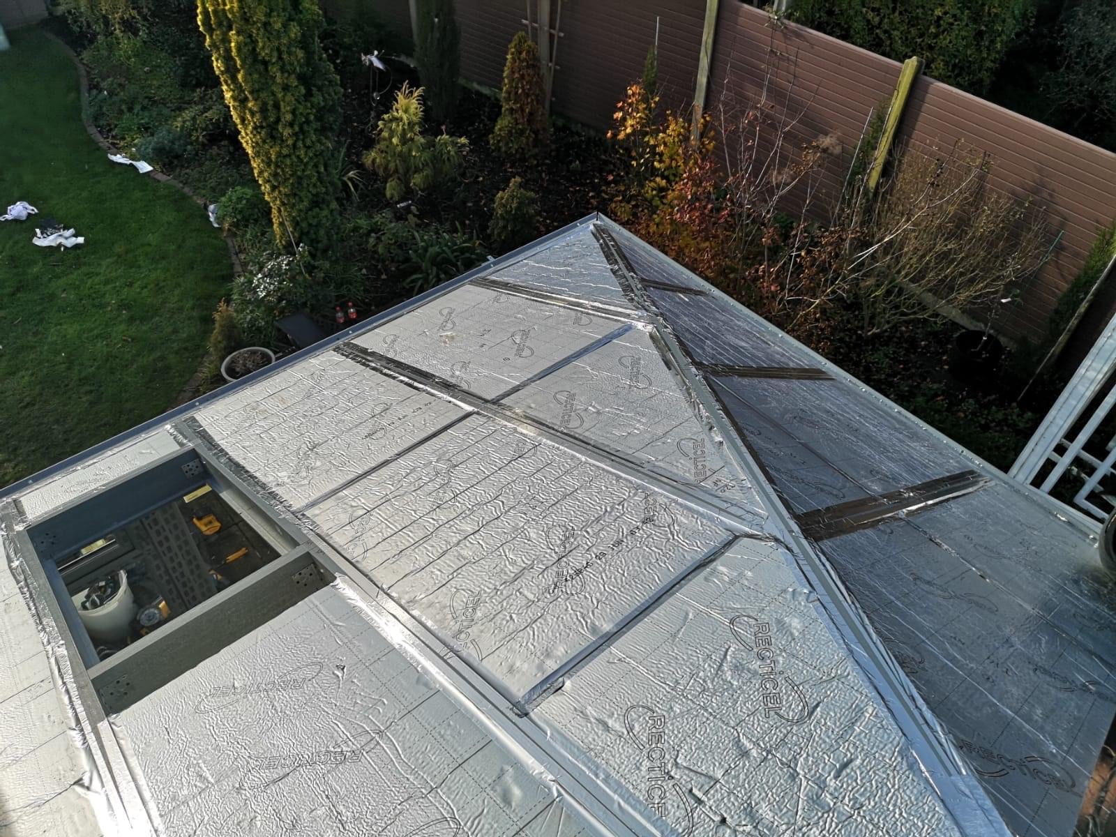 Conservatory roof without tiles in garden