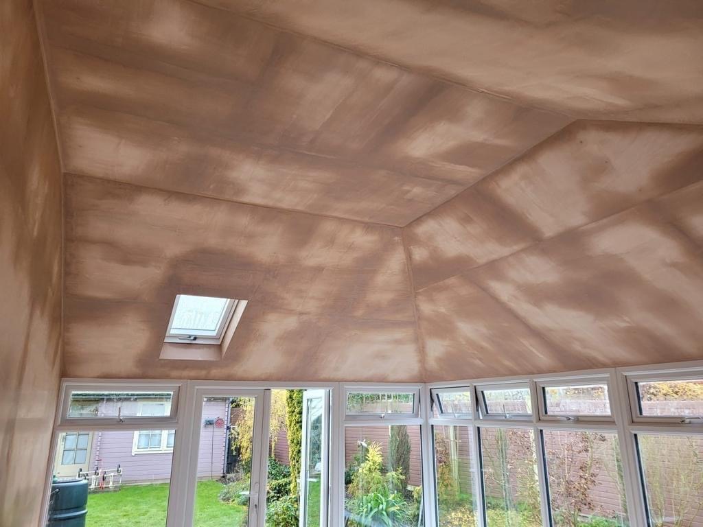 Inside of tiled conservatory roof with plaster finish