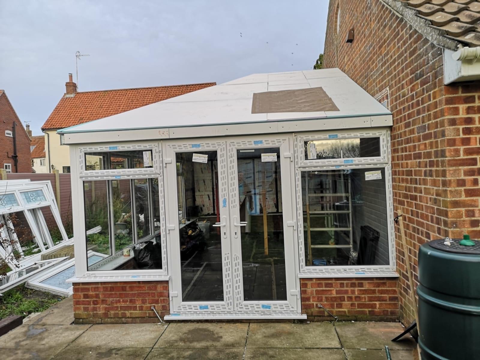 uPVC door fitted in tiled roof conservatory