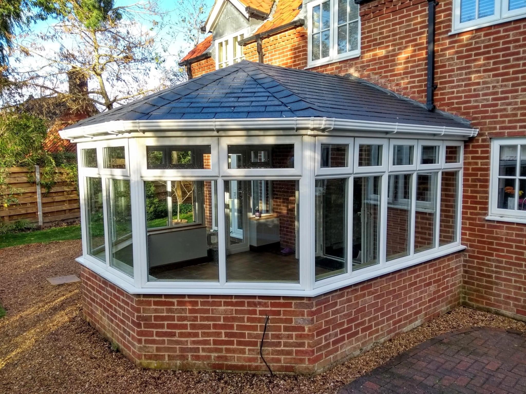 Finished Tiled conservatory with gray slate tiles